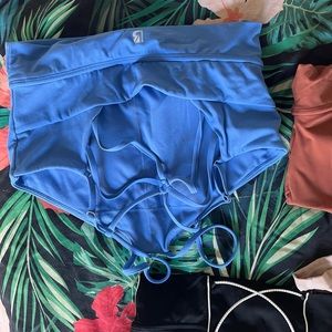 Two large foxy buffbunny sports bras